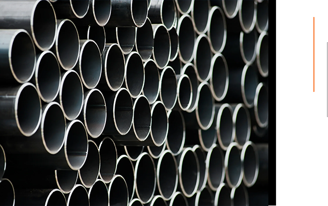 A bunch of pipes that are stacked together.